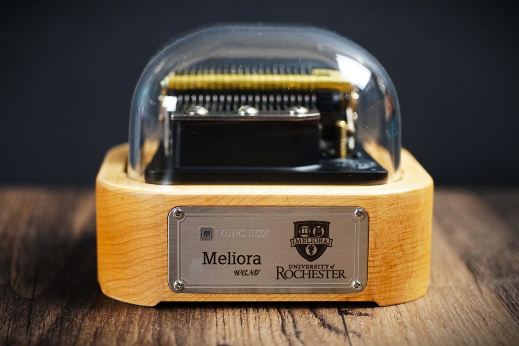 The Front Metal Plate showing the school badge of the University of Rochester, and the Motto "Meliora"